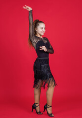 cheerful kid girl ballroom dancer dancing in dress, dance
