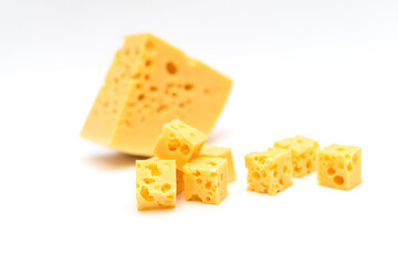 Closeup of cheese cubes with holes