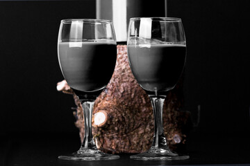 egg liqueur in a glass on wood, coffee liqueur