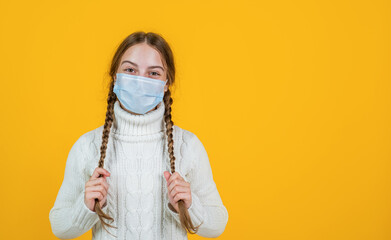 in good mood. patient child wearing respirator mask. safety protective items during coronavirus pandemic outbreak. symptom of covid 19. girl need igg immunity test. virus pneumonia. copy space