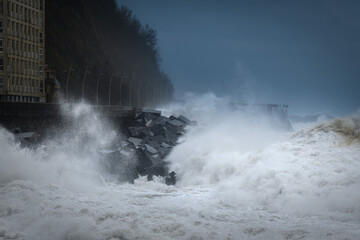 Waves breaking on the New Promenade of San Sebastian during the storm Bella, Spain