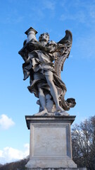 Fototapeta na wymiar angel in the sunlight (antique statue)