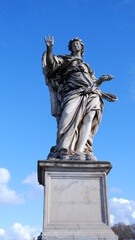 Obraz premium Angel of death. Retro styled ancient statue of sad angel as symbol of pain, fear and end of life.