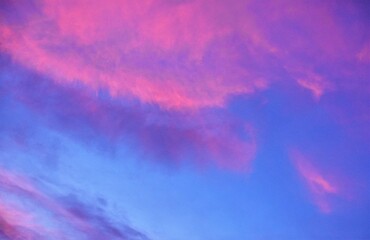 pink clouds against blue sky in the early morning
