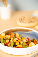 Homemade vegetarian stewed chick-pea chickpeas with vegetables. Concept healthy vegan diet protein organic food dish