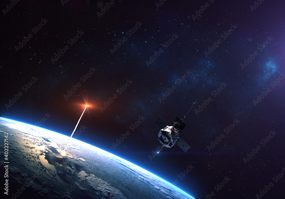 Wall mural rocket launch from the earth planet through the clouds with a bright glow of the engine and a satell