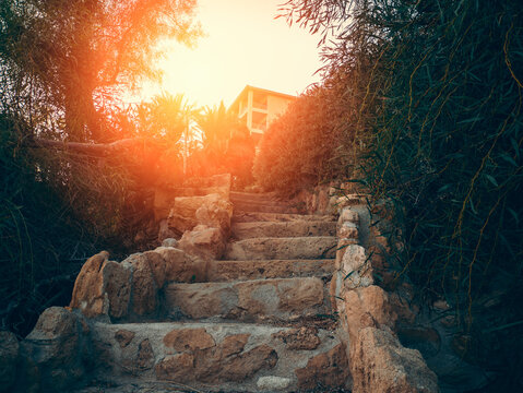 Old stone staircase in sunlight, travel, adventure and moving up concept.