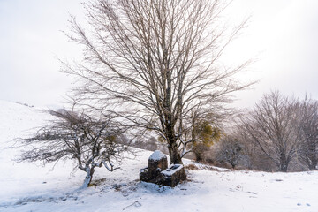 Snowy landscape of Mount Aizkorri in Gipuzkoa. Snowy landscape by winter snows. Basque Country, Spain