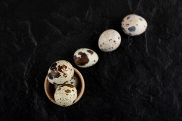 Fresh farm quail eggs in wooden box