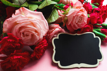 Greeting card for Valentine's Day, Mother's Day, Women's Day or birthday. Flowers and frame for congratulations close-up