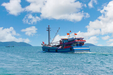 Vietnamese fishing boat in open water