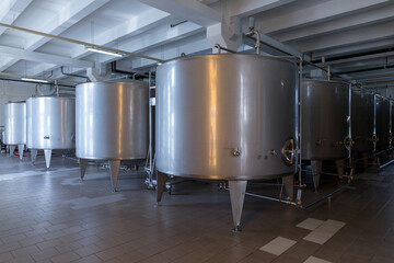Stainless steel barrels and tanks and other containers for liquids in the food industry. Industrial...