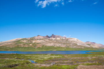 Gaesavatn lake and the mountains of Borgarfjordur and Breidavik in Iceland