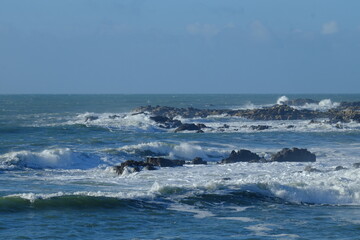The granit coast during a sunny and stormy day. in the west of France on the Atlantic ocean, december 2020.