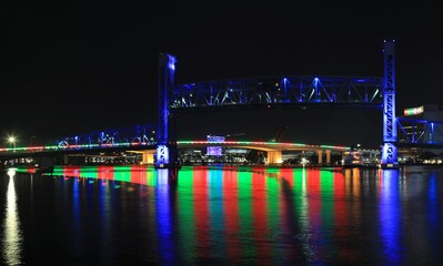 Fototapeta na wymiar Raised bridge, permanent bridge with colorful lights reflecting