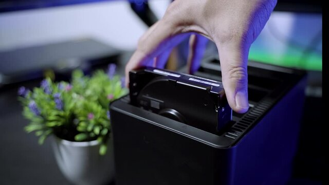 4K UHD Footage Of Man hand installing 3.5 inch HDD to External HDD Enclousure 