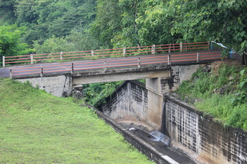 a bridge that connects the village with the nearest town