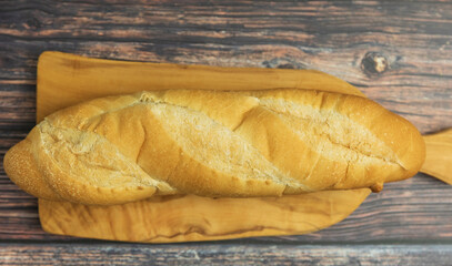  a loaf of bread on the cutting board