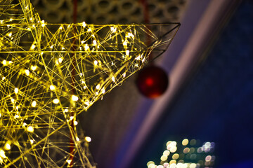 Fototapeta na wymiar Beautiful christmas decoration. strong colors beautiful light, stars and atmosphere.