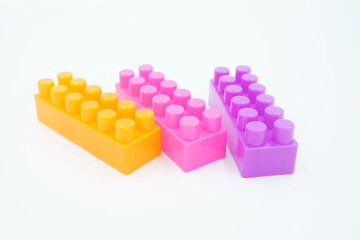 colored stacking blocks on a white background