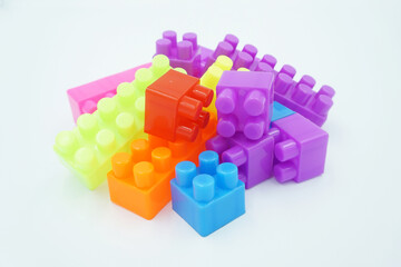 colored stacking blocks on a white background