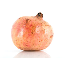 One pomegranate on white background