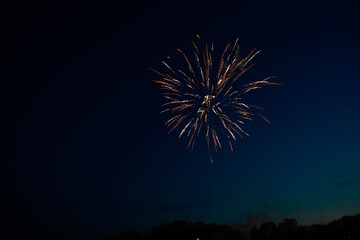 Real fireworks in the night with a dark blue sky Background