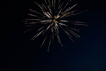 Fototapeta premium Real fireworks in the night with a dark blue sky Background