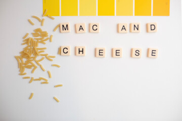 flat lay scrabble tiles spelling out mac and cheese