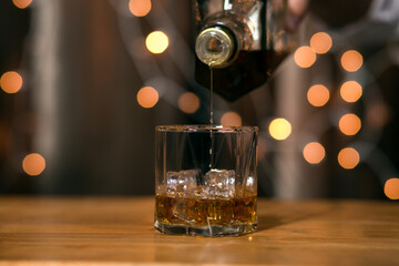 Bartender Serve Whiskey, on wood bar