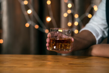 Barman pouring whiskey whiskey glass beautiful night