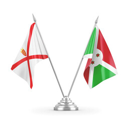 Burundi and Jersey table flags isolated on white 3D rendering