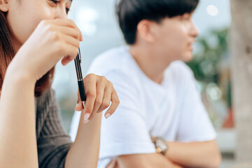 High school or college students  group catching up workbook and learning tutoring on desk and reading, doing homework, lesson practice preparing exam.