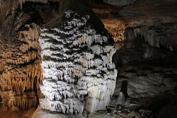 Stalactites hold tight to the ceiling, and Stalagmites on floor. Fantastic Cavern, Springfield, Missouri. 