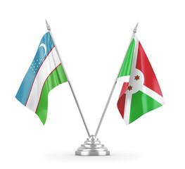 Burundi and Uzbekistan table flags isolated on white 3D rendering