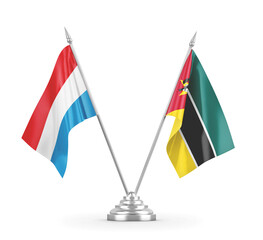 Mozambique and Luxembourg table flags isolated on white 3D rendering