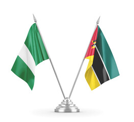 Mozambique and Nigeria table flags isolated on white 3D rendering