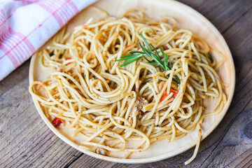 spaghetti pasta on tray wooden table background easy cooking at home, Homemade Spaghetti