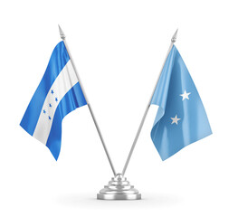 Micronesia and Honduras table flags isolated on white 3D rendering