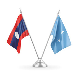 Micronesia and Laos table flags isolated on white 3D rendering.