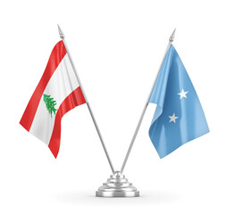 Micronesia and Lebanon table flags isolated on white 3D rendering