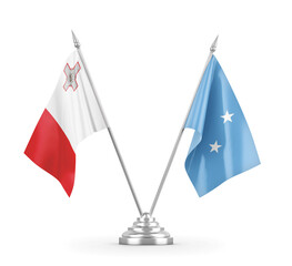 Micronesia and Malta table flags isolated on white 3D rendering
