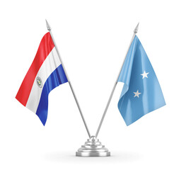 Micronesia and Paraguay table flags isolated on white 3D rendering