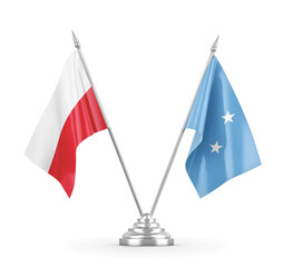 Micronesia and Poland table flags isolated on white 3D rendering