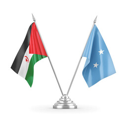Micronesia and Western Sahara table flags isolated on white 3D rendering