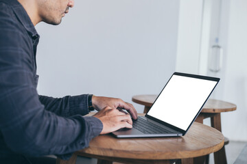 computer screen blank mockup.hand woman work using laptop with white background for advertising,contact business search information on desk at coffee shop.marketing and creative design