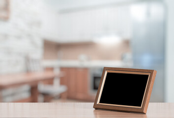 photo frame on the wooden table
