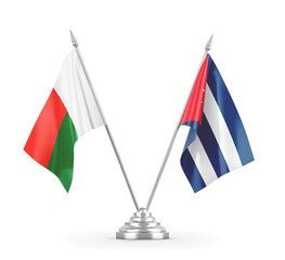 Cuba and Madagascar table flags isolated on white 3D rendering