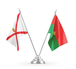 Burkina Faso and Jersey table flags isolated on white 3D rendering