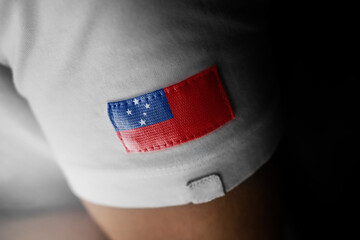Patch of the national flag of the Samoa on a white t-shirt